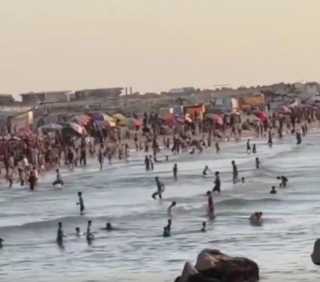 جحيما الحر والحرب يعيدان الحياة لشواطئ غزة