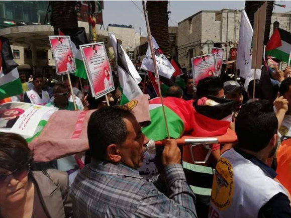 وقفة بنابلس تنديدًا باغتيال المسعفة رزان النجار