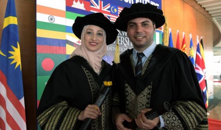 زوجان من غزة يحصلان على الدكتوراه وجائزة التميز بماليزيا