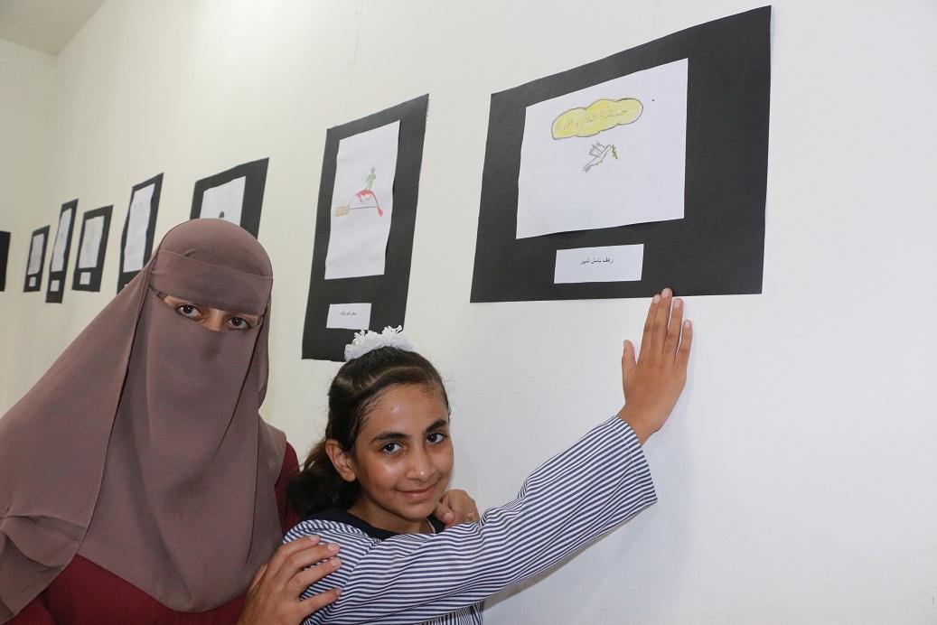 رسامو كاريكاتير أطفال بغزة ينقلون هموم الوطن بأناملهم الصغيرة
