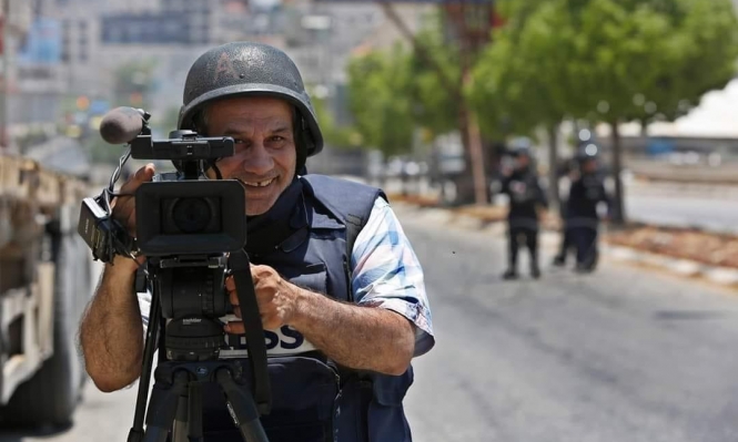 الإعلامي الحكومي يدين فصل (AP) الصحفي إياد حمد
