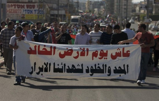 إصابات واعتقالات في مسيرات يوم الأرض في الضفة وغزة
