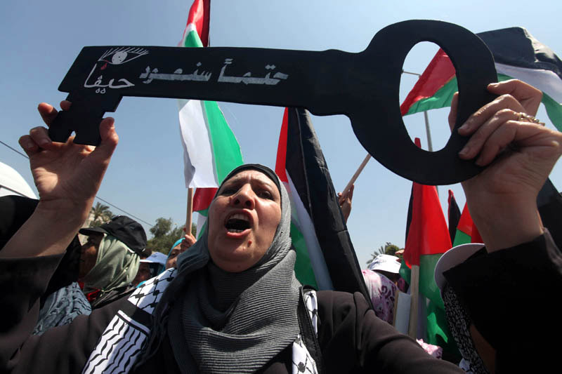 الفلسطينيون يشاركون في تظاهرة كبيرة أمام مقر الأمم المتحدة بغزة في ذكرى النكبة