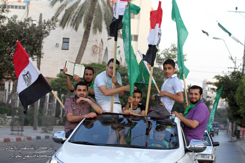 بالصور مسيرات بغزة ابتهاجًا بفوز مرسي ورئيس الوزراء إسماعيل هنية يهنئه بالفوز