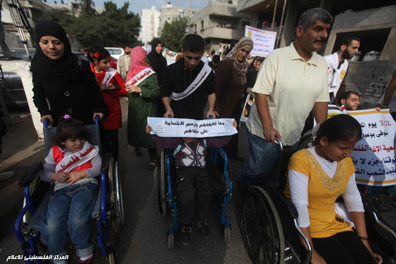 مسيرة لأصحاب الاحتياجات الخاصة رفضا للحصار على غزة