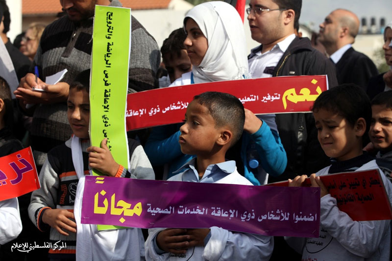 مسيرة في يوم المعاق العالمي تطالب بحقوق المعاقين وتفعيل قانون المعاق من قبل المجلس التشريعي‏